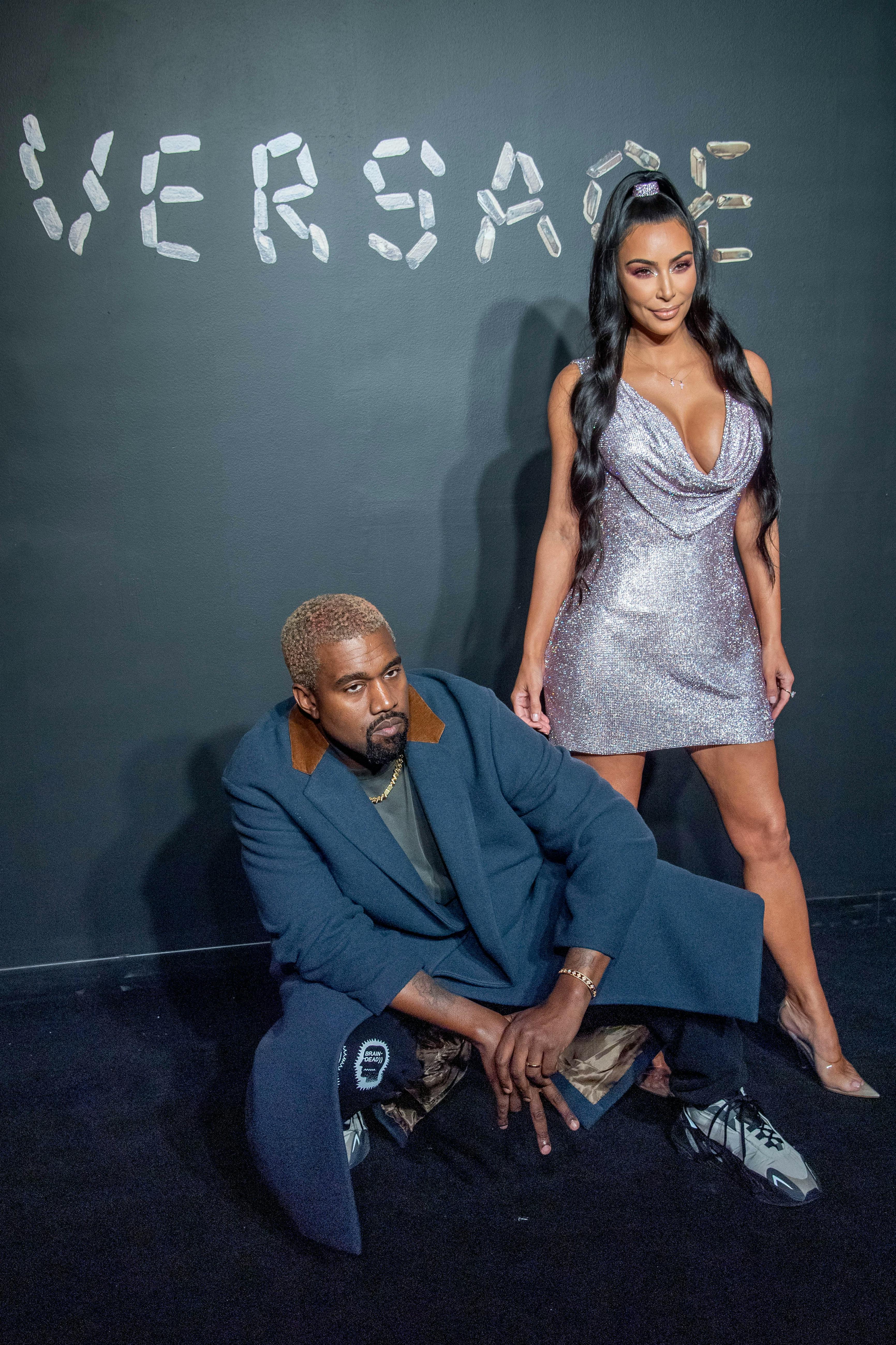 Kanye West and Kim Kardashian West attend the Versace fall 2019 on December 2, 2018, in New York City. (Photo by Roy Rochlin/Getty Images)